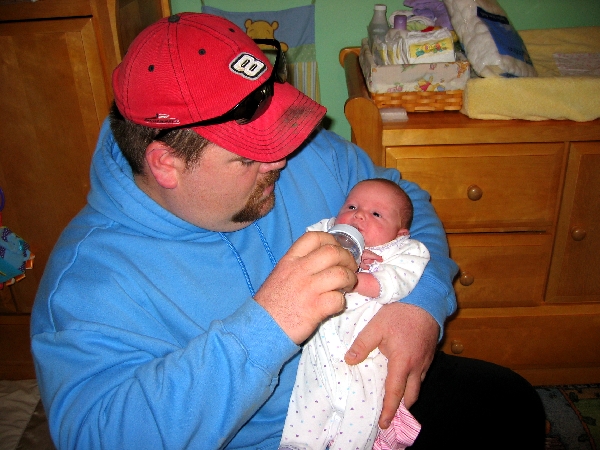 Dad does a feeding