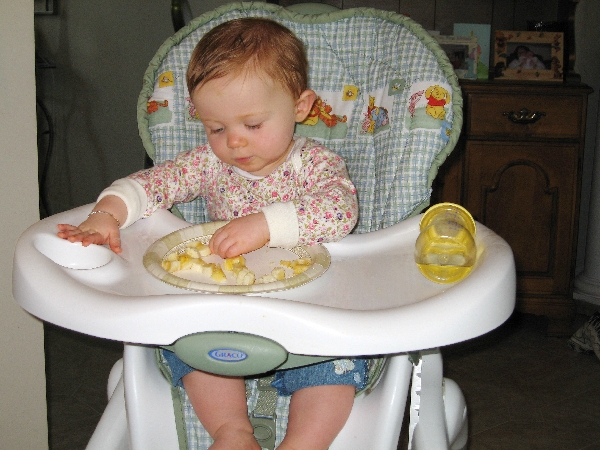 Feeding herself some fruit