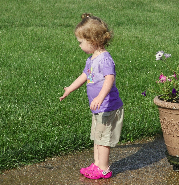 Playing in the Sprinkler