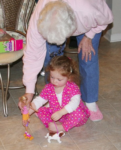 Barbie rollerscates with her dog