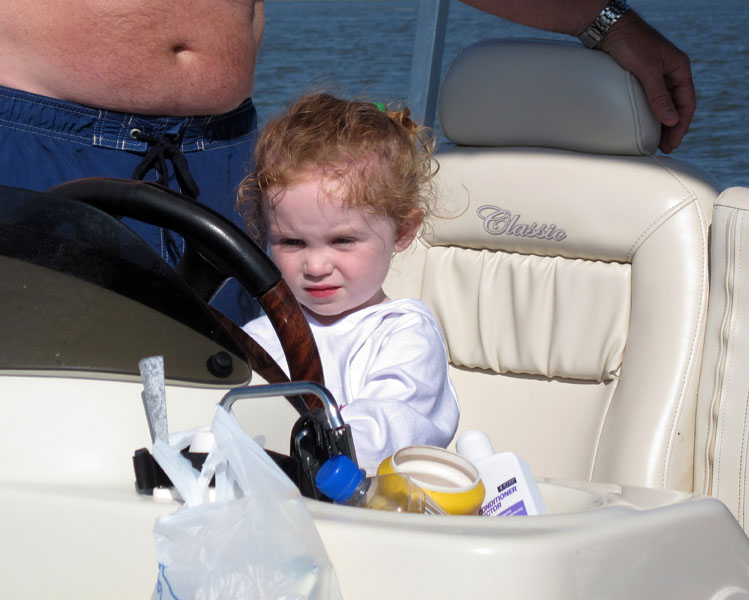 Captain Amber steers the boat