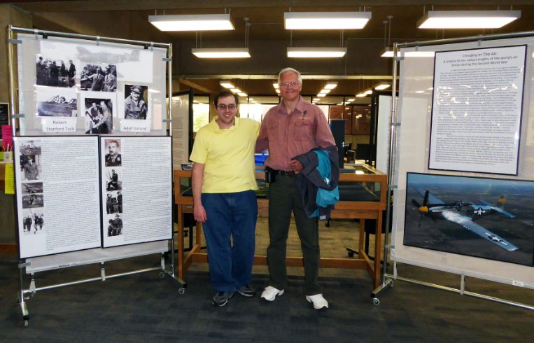 Greg and his exhibit on World War II Fighter Pilots on display in the Brockport College Library