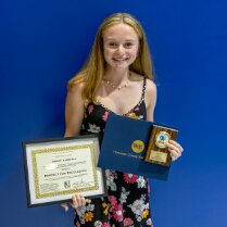 Amber and her three awards